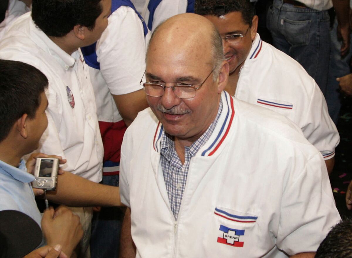 FILE - El Salvador's former President Alfredo Cristiani attends a Nationalist Republican Alliance, or Arena, general assembly in San Salvador, Oct. 10, 2008. A judge ordered Cristiani on Friday, March 11, 2022, to preventive detention after he was charged in the 1989 massacre of six Jesuit priests. Cristiani has denied any involvement. (AP Photo/Edgar Romero, File)