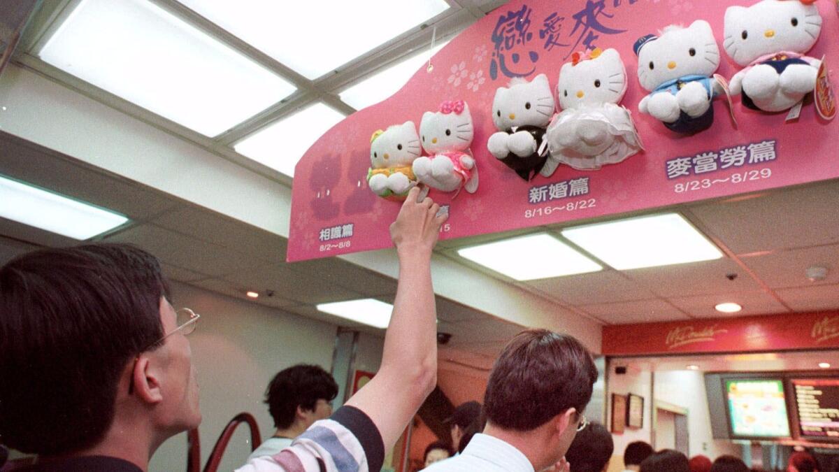 Hello Kitty dolls are part of a promotion at a McDonald's restaurant in Taipei, Taiwan, on Aug. 3, 1999.
