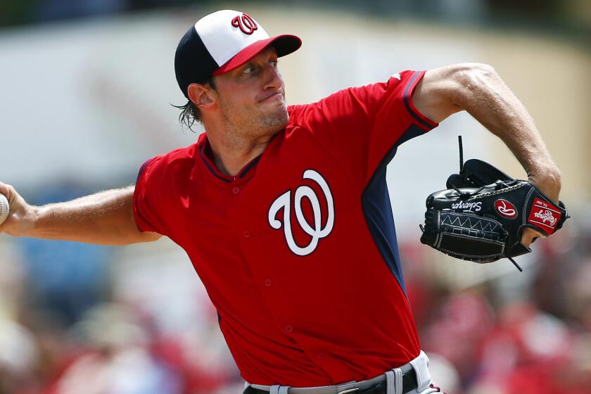 Washington Nationals starter Max Scherzer delivers a pitch during an exhibition game against the St. Louis Cardinals on March 25.
