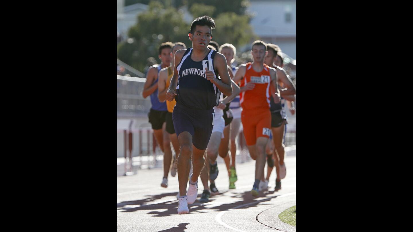 Newport Harbor High's Alexis Garcia runs in the Eric Hulst boys' 3,200-meter race during the Laguna Beach Trophy Invitational at Laguna Beach High on Saturday, March 16, 2019.