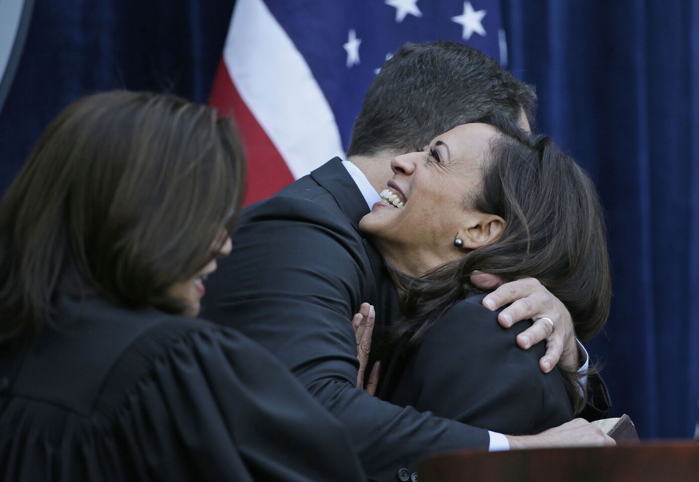 Jan. 5, 2015: California Atty. Gen. Kamala Harris is embraced by her husband after taking the oath of office