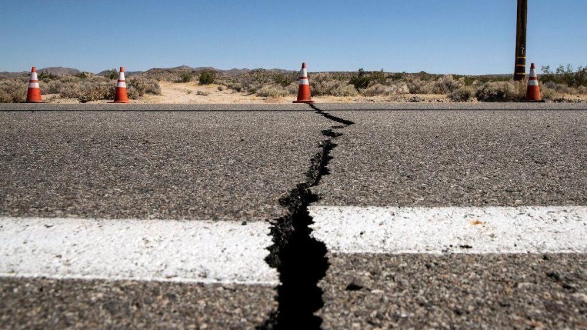 A crack in the road after the earthquake near Ridgecrest.