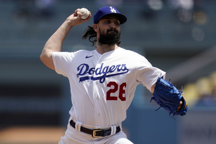 Los Angeles Dodgers starting pitcher Tony Gonsolin throws to an Atlanta Braves batter during the first inning of a baseball game Wednesday, April 20, 2022, in Los Angeles. (AP Photo/Marcio Jose Sanchez)