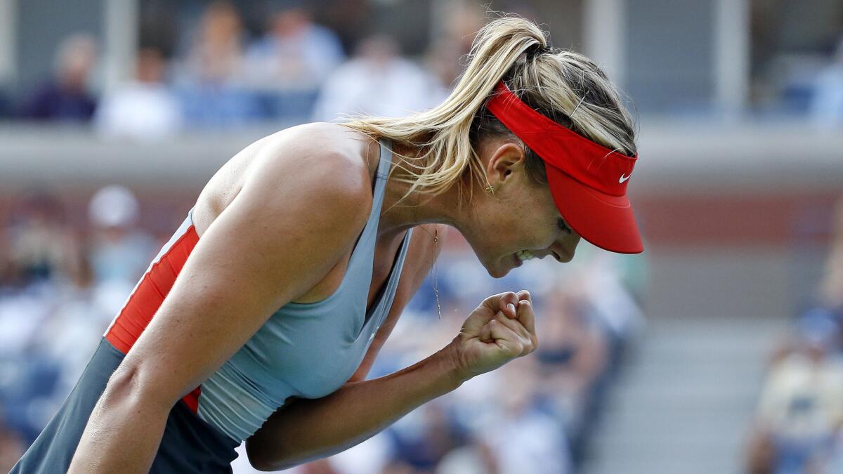 Maria Sharapova celebrates after winning a point during her second-round win over Alexandra Dulgheru at the U.S. Open on Wednesday.