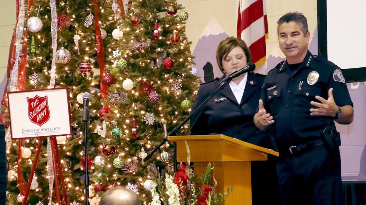 Glendale Salvation Army's Lt. Jennifer Shiflett and Glendale Police Chief Rob Castro at Friday's breakfast at the organization's headquarters.