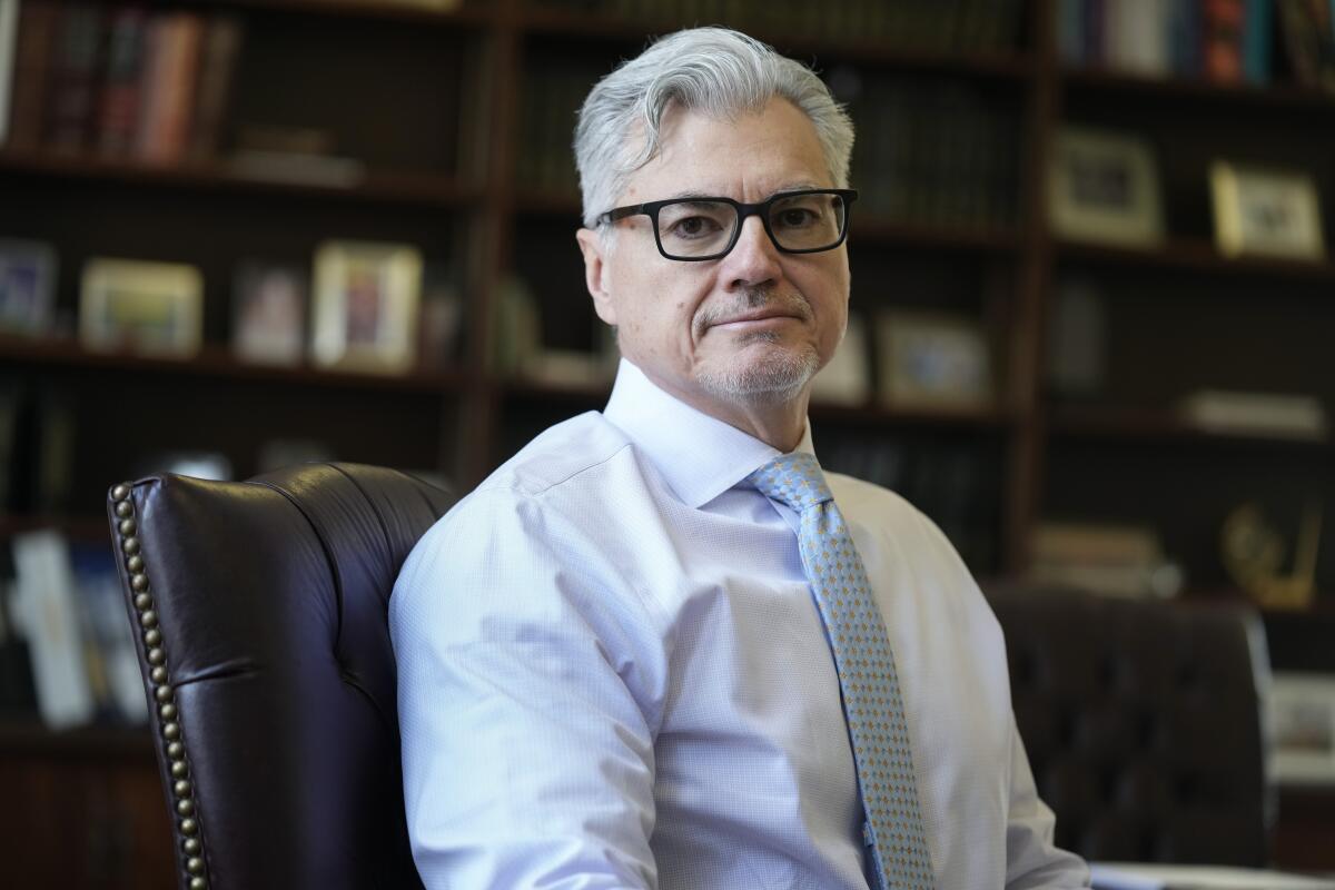 Judge Juan M. Merchan poses in his chambers in New York.