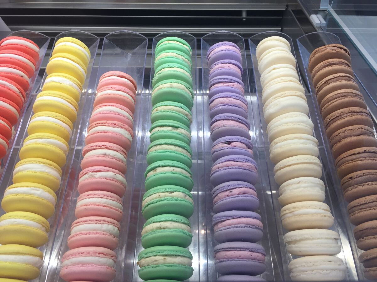 A variety of fresh-baked fruit-flavored macarons for sale at newly opened D'Liteful Chocolat Patisserie & Chocolatier in Lake San Marcos.