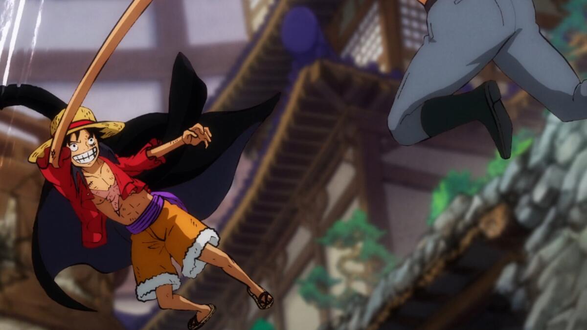 Monkey D. Luffy punching an opponent with his stretchy arms