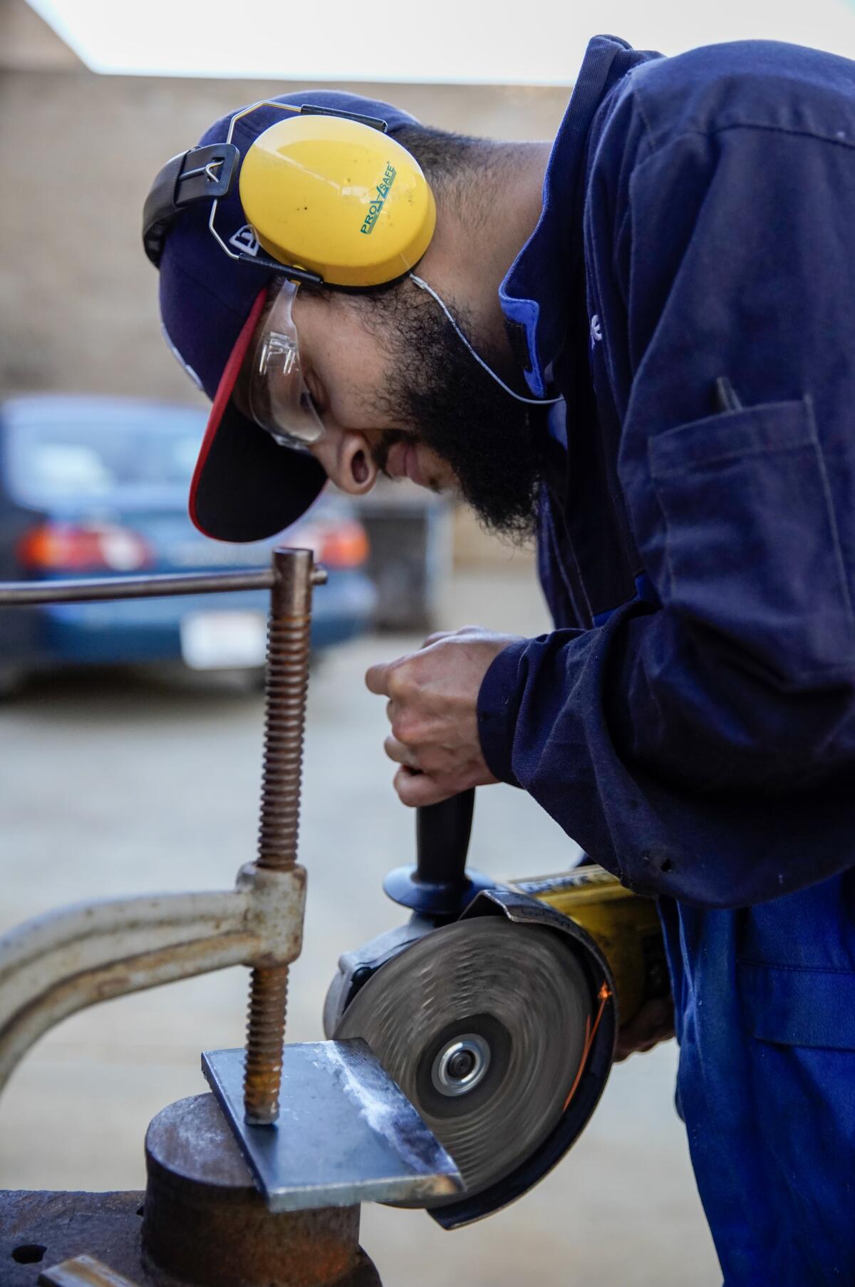 Student Nathan Torres welds at the San Diego College of Continuing Education's Educational Cultural Complex