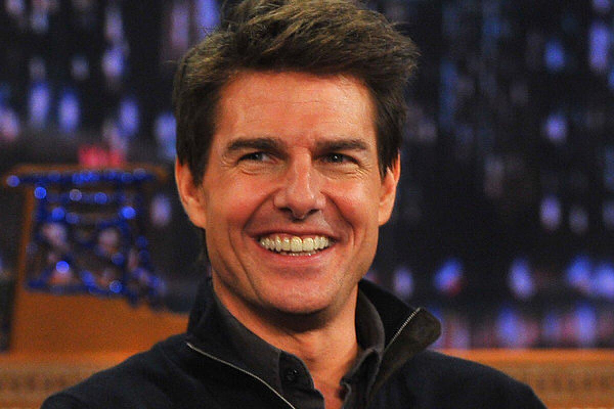 Tom Cruise visited "Late Night With Jimmy Fallon" on Dec. 18, the same night he was reportedly spotted out dancing with a younger woman.