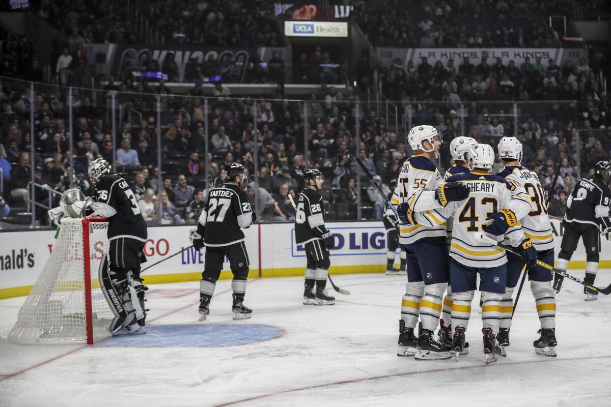 The Buffalo Sabres celebrate a second-period goal against the Kings on Thursday.