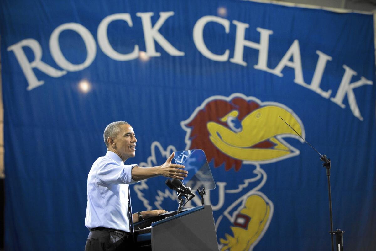 President Obama speaks at the University of Kansas in Lawrence about his "middle-class economics" initiative. Kansas' Republican governor has pursued austere fiscal policies, but has had to back off them as state revenues have lagged.
