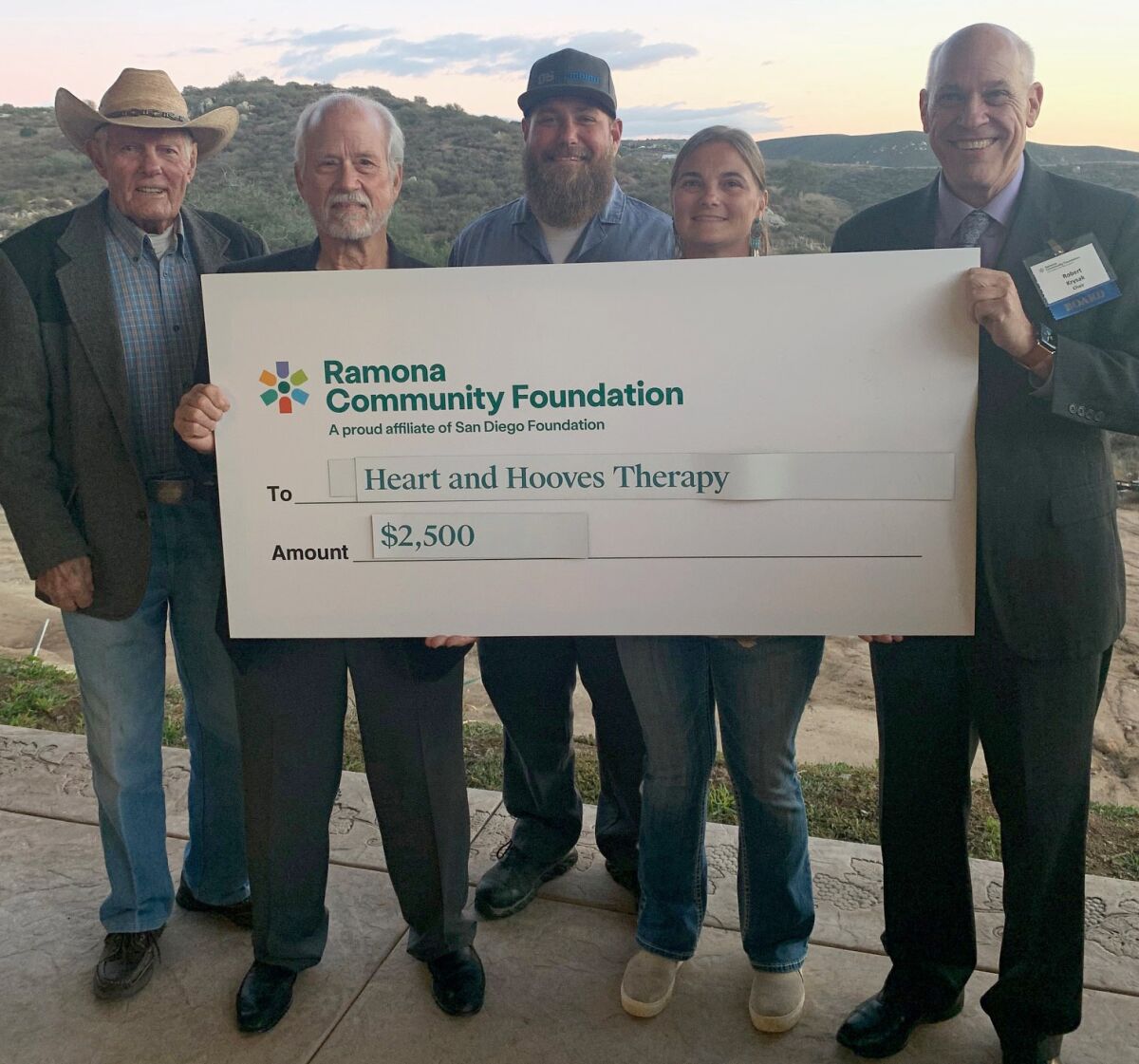 Heart and Hooves Therapy accepts a $2,500 check from Ramona Community Foundation. 