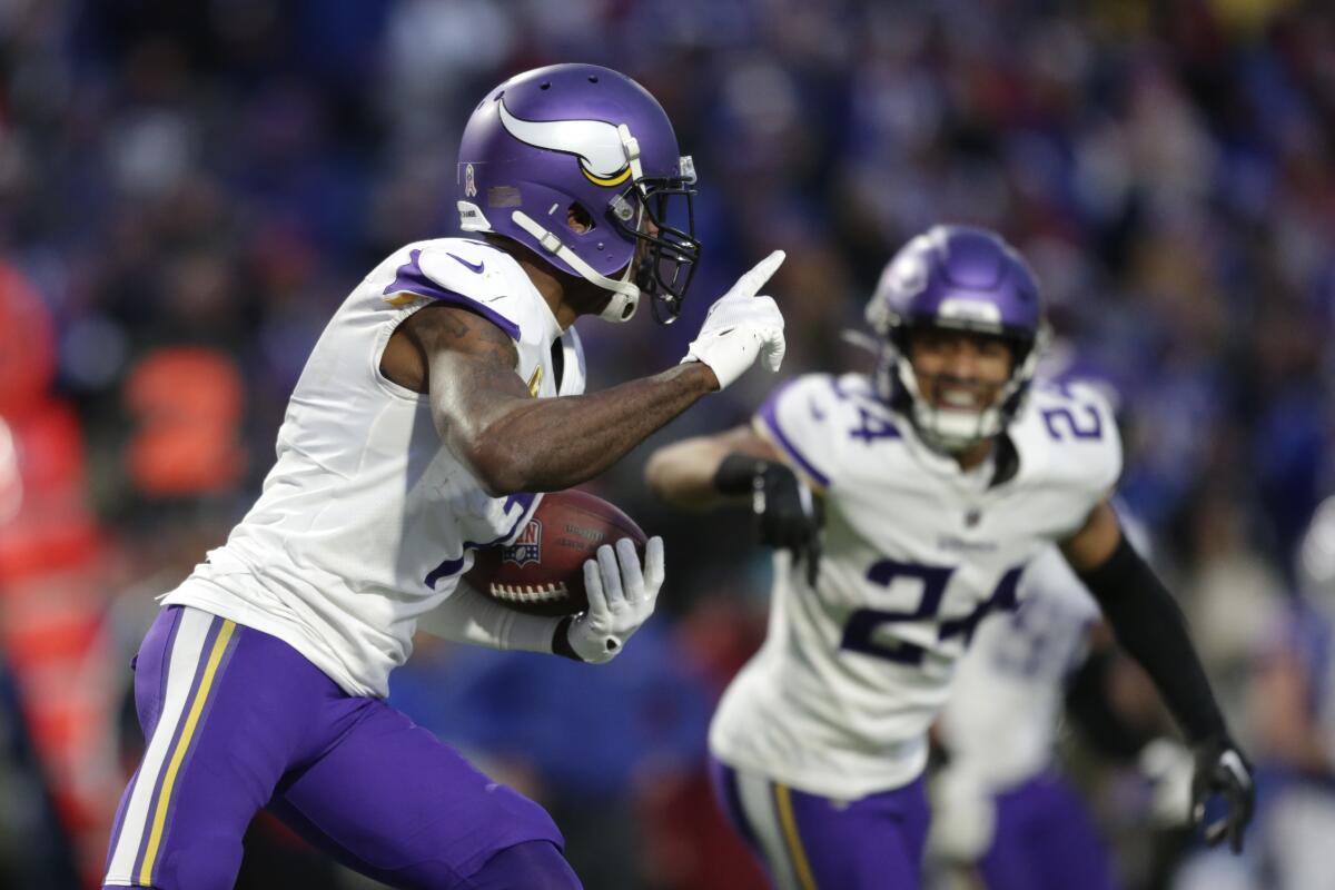 End zone picks for Vikings is Peterson's latest contribution - The San  Diego Union-Tribune