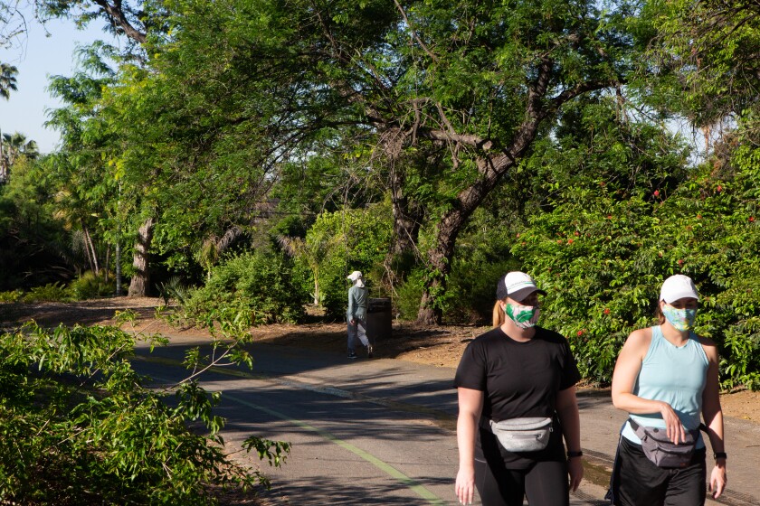 Visitors practice social distancing at the Los Angeles County Arboretum & Botanic Garden in Arcadia. 