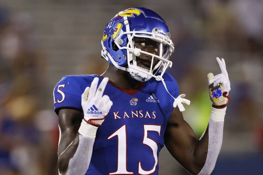 FILE - Kansas linebacker Craig Young gestures during an NCAA football game on Friday, Sept. 2, 2022, in Lawrence, Kan. Transfers have made major impacts around the Big 12, none more than at surprising unbeatens TCU and Kansas. (AP Photo/Colin E. Braley)