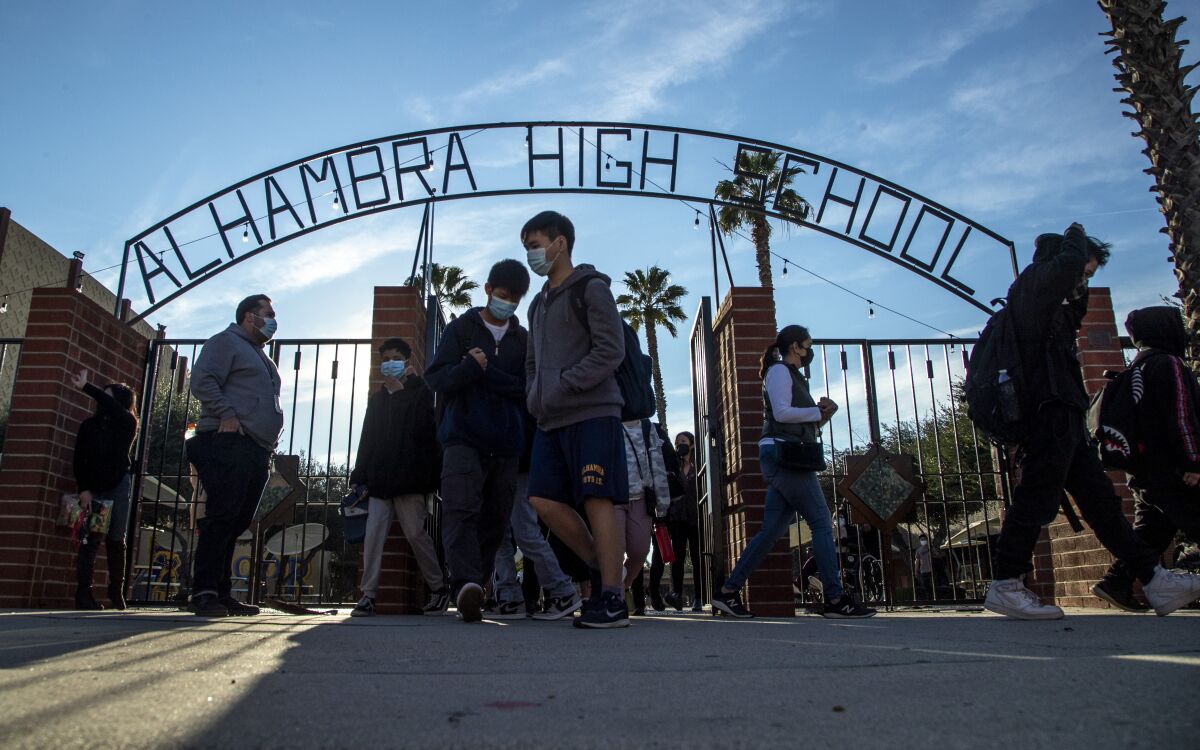 Alhambra High School students walk off campus after the first day of school following winter break on Jan. 3. 