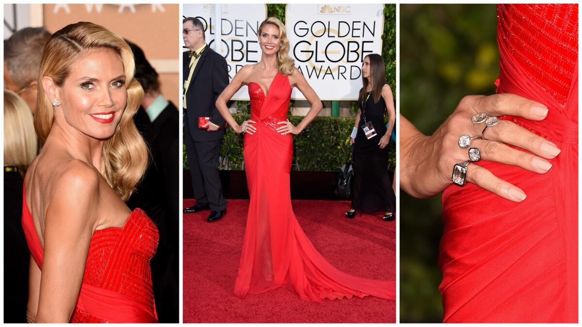 Heidi Klum's asymmetrical Versace gown made her look asymmetrical too.