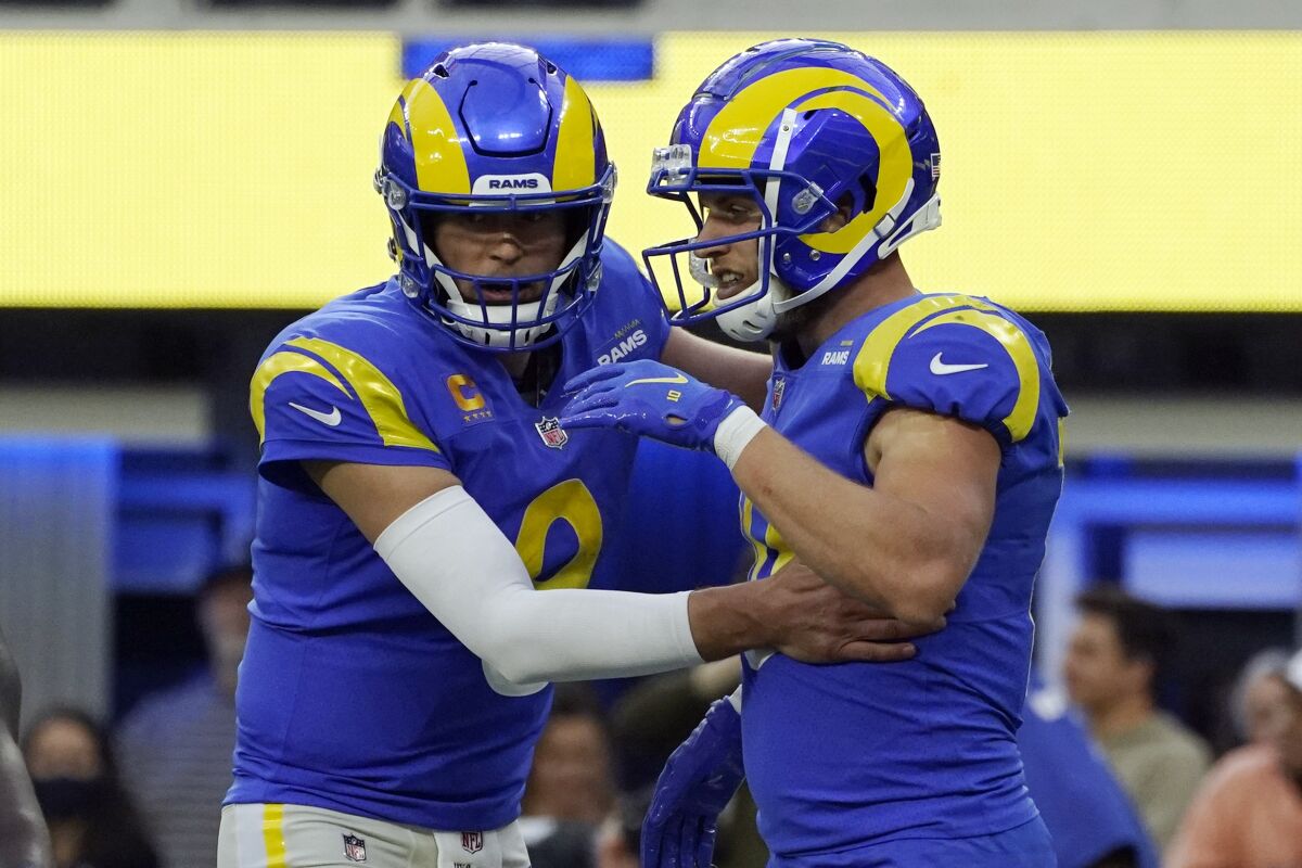 Rams wide receiver Cooper Kupp, right, celebrates with quarterback Matthew Stafford.