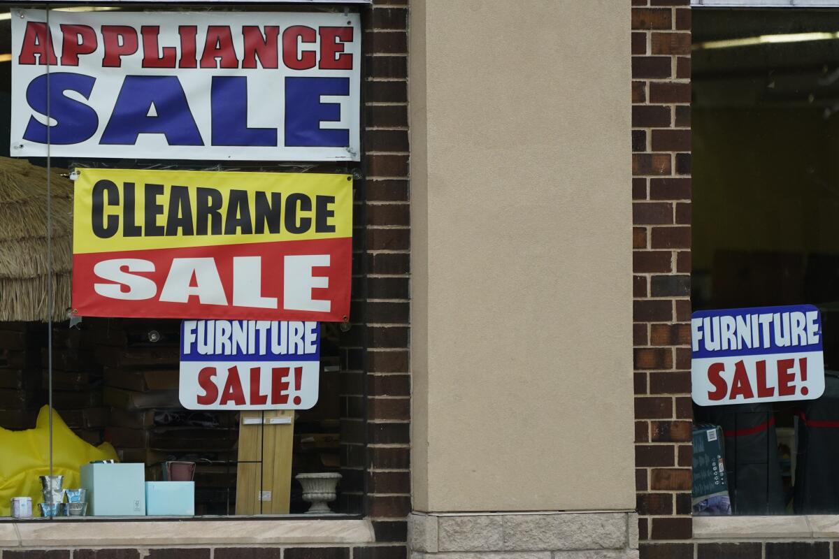 Sale signs at an appliance store 