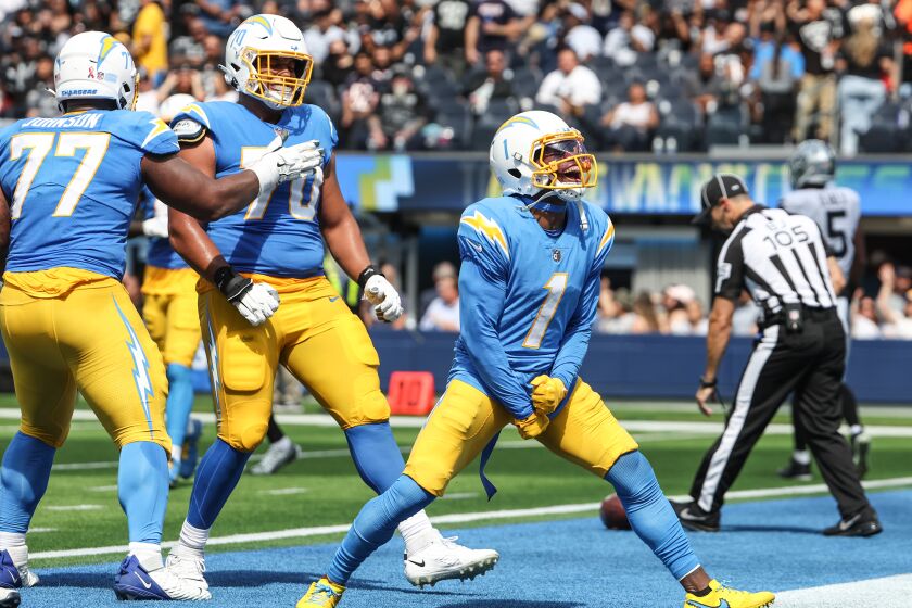 Inglewood, CA, Sunday, September 11, 2022 - Charger receiver DeAndre Carter celebrates after catching touchdown pass in the second quarter against the Las Vegas Raiders at SoFi Stadium. (Robert Gauthier/Los Angeles Times)