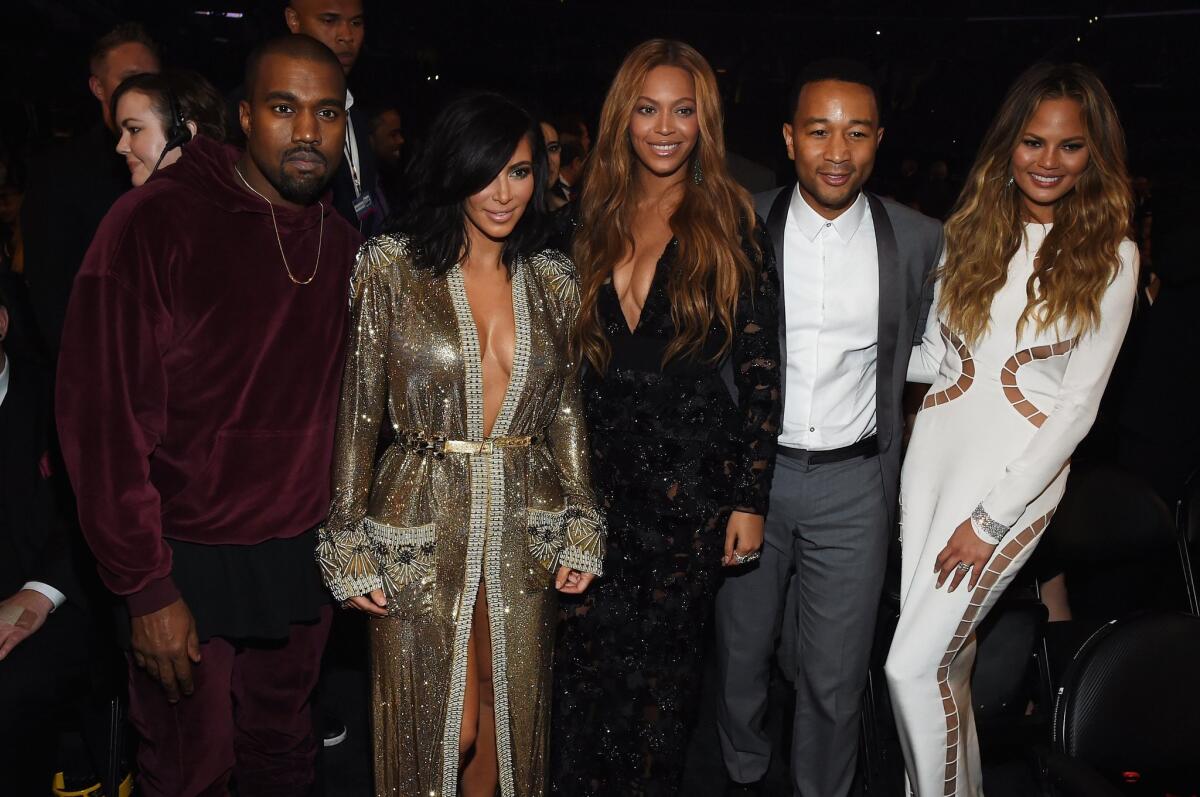 Kanye West, left, Kim Kardashian, Beyonce, John Legend and Chrissy Teigen attend the 57th Grammy Awards.