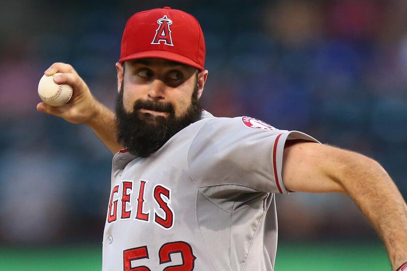 Angels starter Matt Shoemaker delivers a pitch during a Sept. 10 game against the Texas Rangers. Shoemaker suffered a rib-cage strain Monday against the Seattle Mariners.