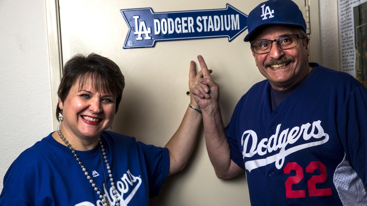 Mary Jones and Bill Snoberger have a helpful reminder about which way to travel to Dodger Stadium.