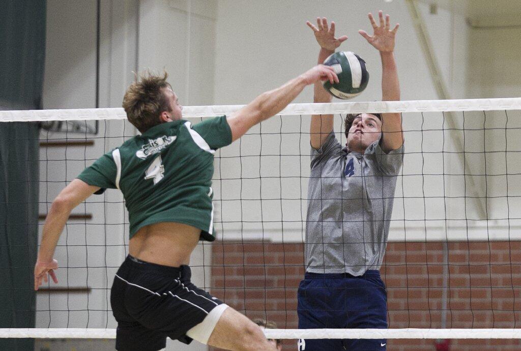 Newport Harbor High's Spencer Lawrence blocks a shot from Edison's Garrett White during a Sunset League match at Edison on Tuesday.