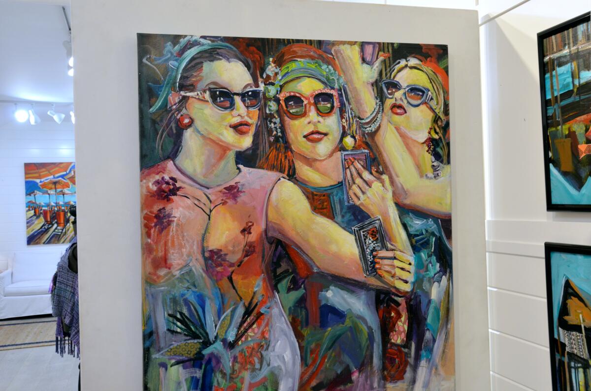 Kathleen Carrillo's three diva's painting is on display at the new Balboa Island Gallery at 121 Agate Ave. Balboa Island.