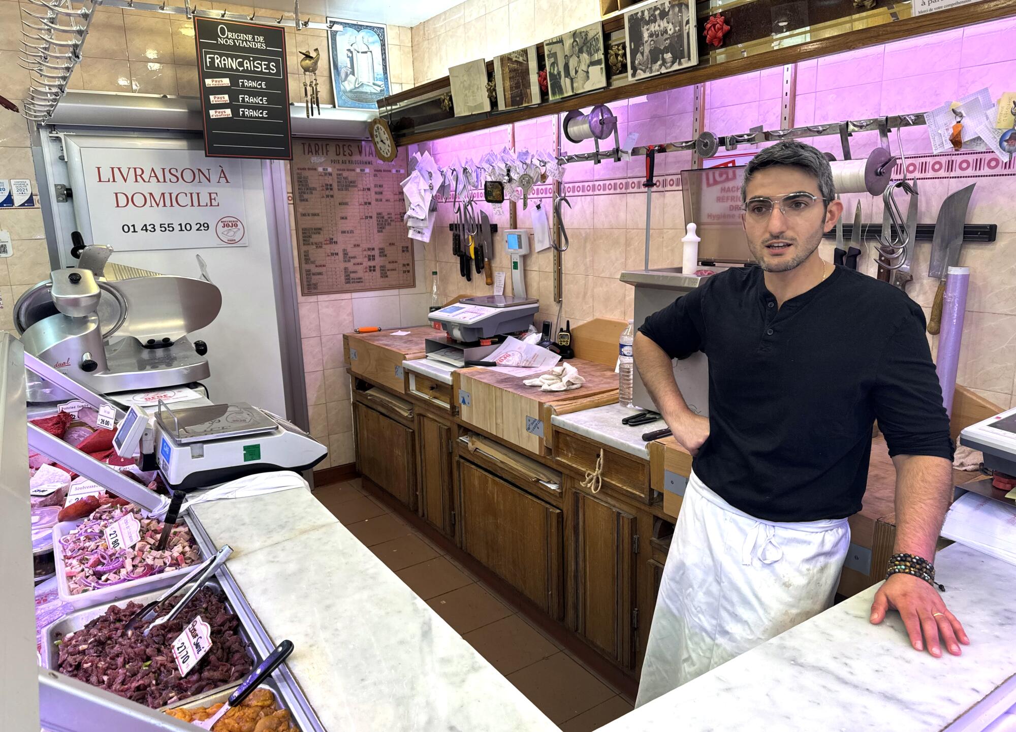Joseph Slama works at the Jojo kosher butcher shop in the Belleville section of Paris.