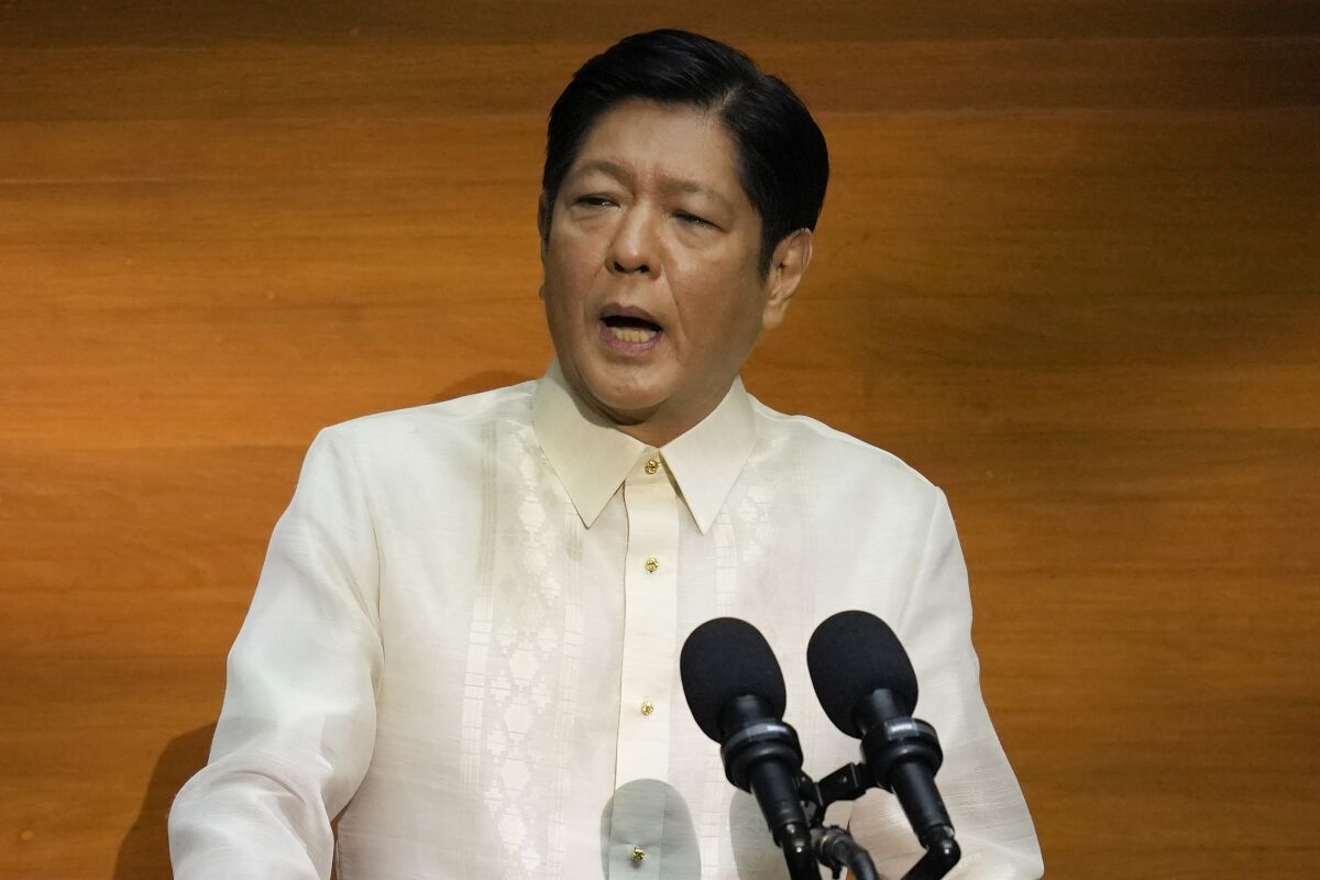 FILE- Philippine President Ferdinand Marcos Jr. delivers his first state of the nation address in Quezon City, Philippines, Monday, July 25, 2022. Marcos Jr. may fire top agricultural officials if an investigation shows that they maliciously decided to import sugar amid a shortage without his approval and then publicized the plan, the press secretary said Thursday Aug. 11. 2022. (AP Photo/Aaron Favila, Pool, File)