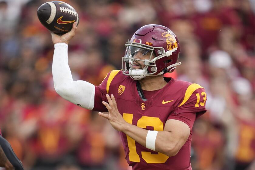 Southern California quarterback Caleb Williams (13) throws during the first half of an NCAA college football game against UCLA in Los Angeles, Saturday, Nov. 18, 2023. (AP Photo/Ashley Landis)