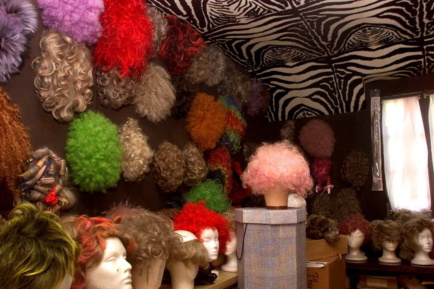 Phyllis Diller's costume and wig room included hair pieces of seemingly every color. How many? She responded with her signature laugh, saying, "I never counted."
