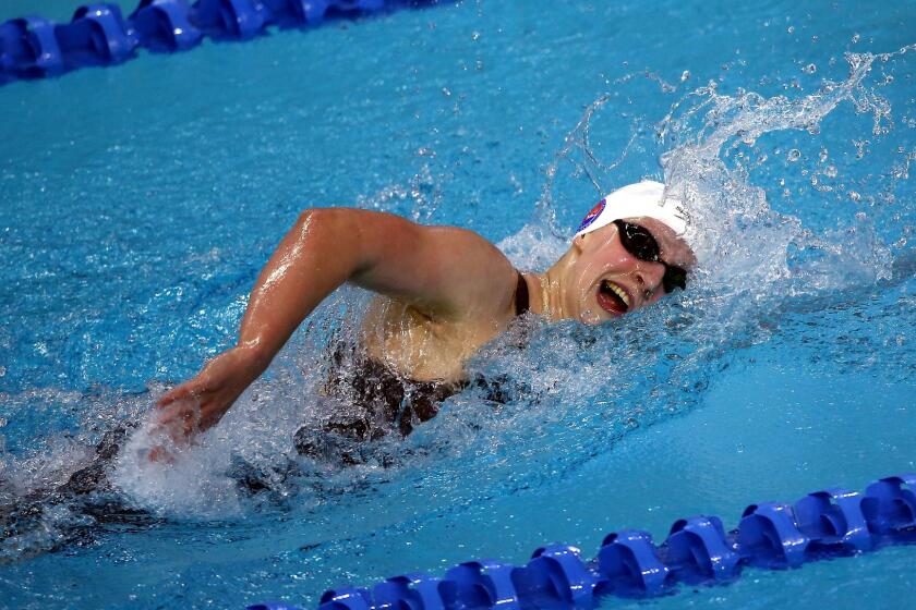 Katie Ledecky swims in the women's 800-meter freestyle final during the Arena Pro Swim Series at Austin on Sunday.