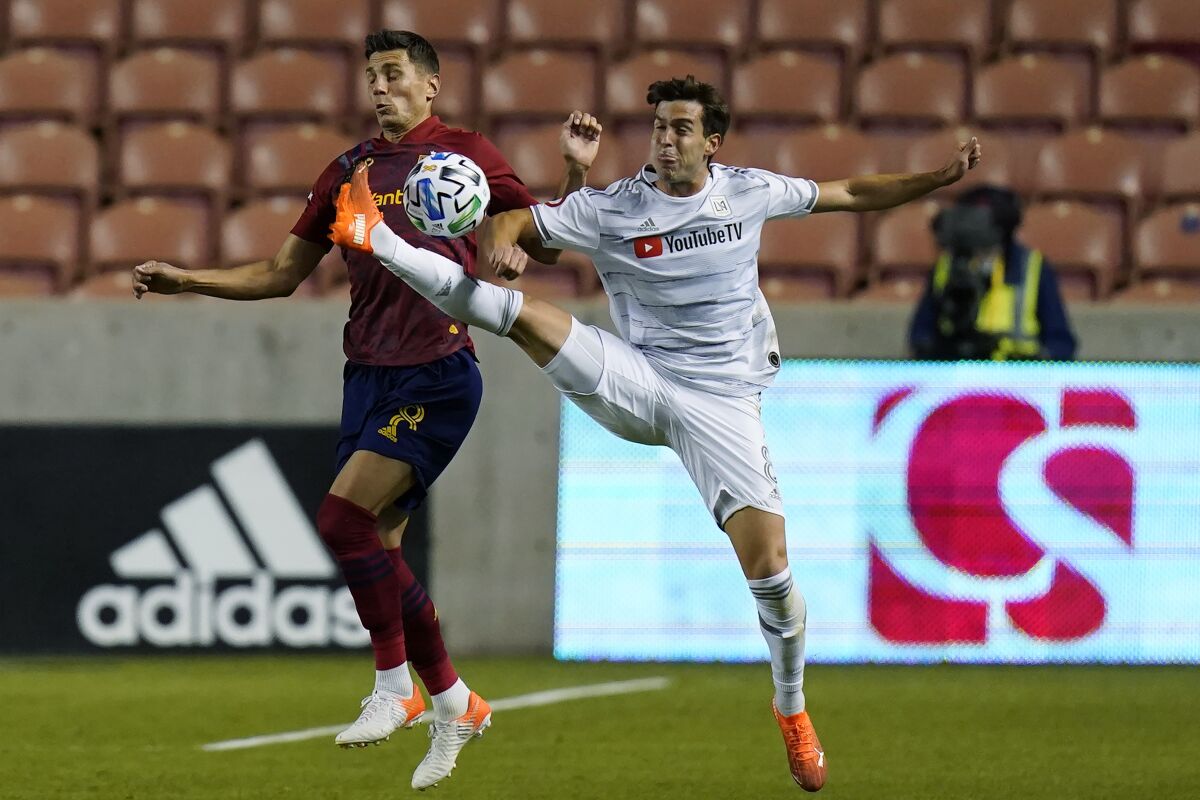 Real Salt Lake midfielder Damir Kreilach defends against LAFC midfielder Francisco Ginella.