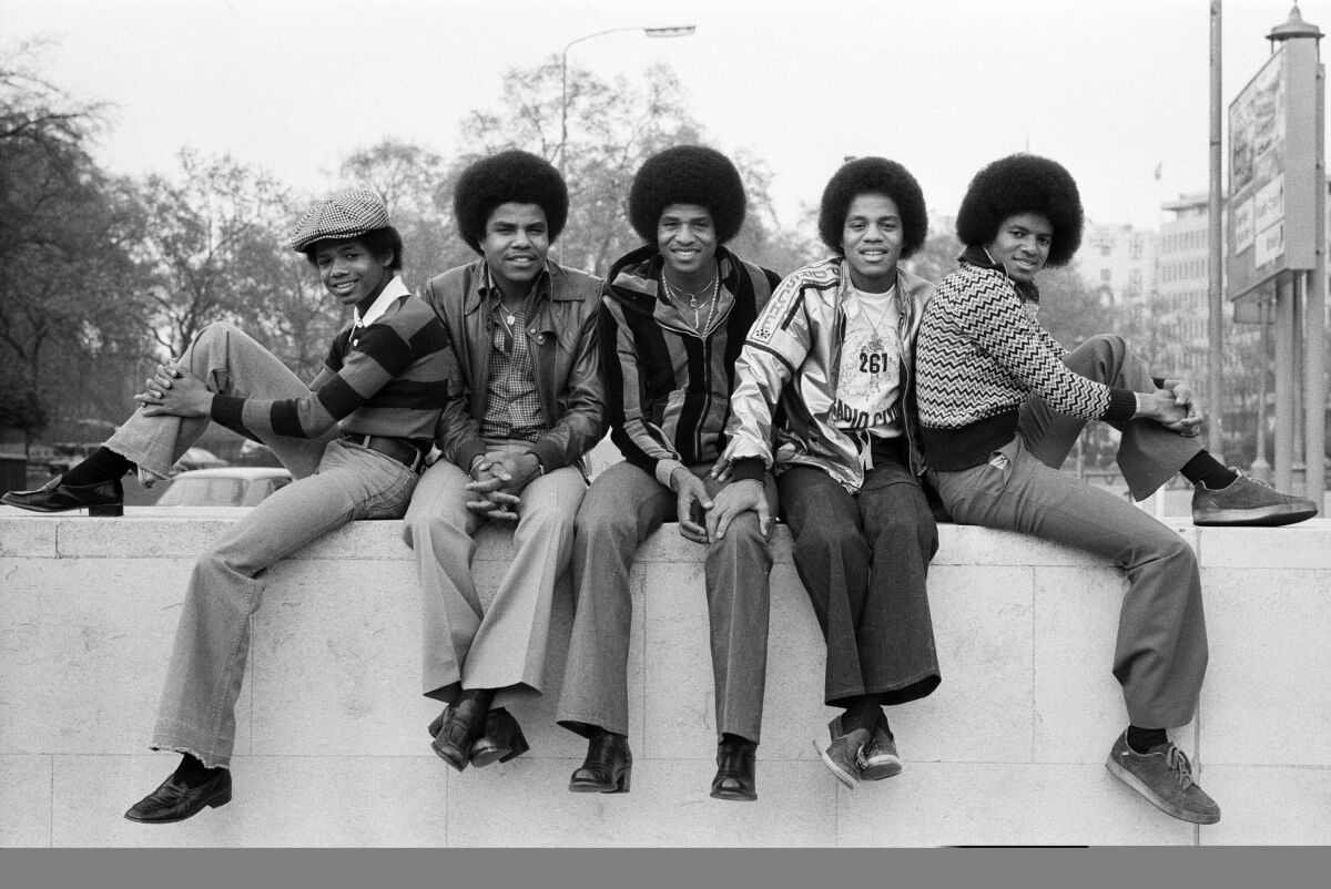 The Jacksons pose at Hyde Park Corner. 