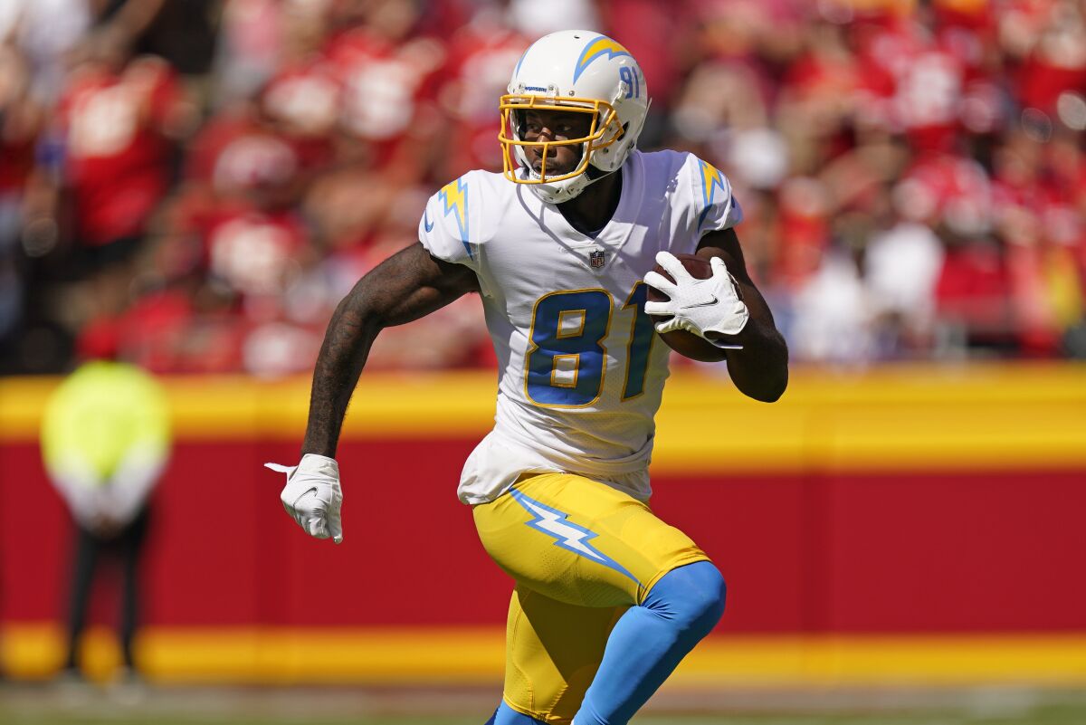 Chargers wide receiver Mike Williams runs the ball during a game against the Chiefs in September 2021.