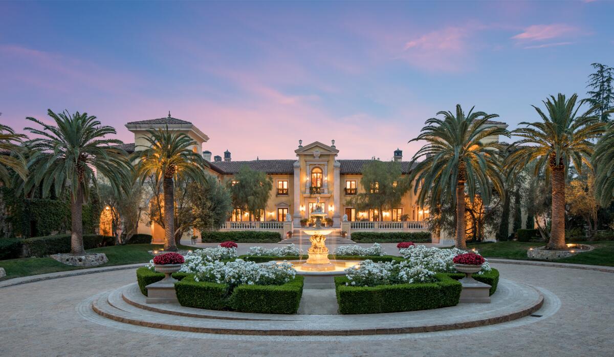 The estate centers on an Italian-inspired mansion.