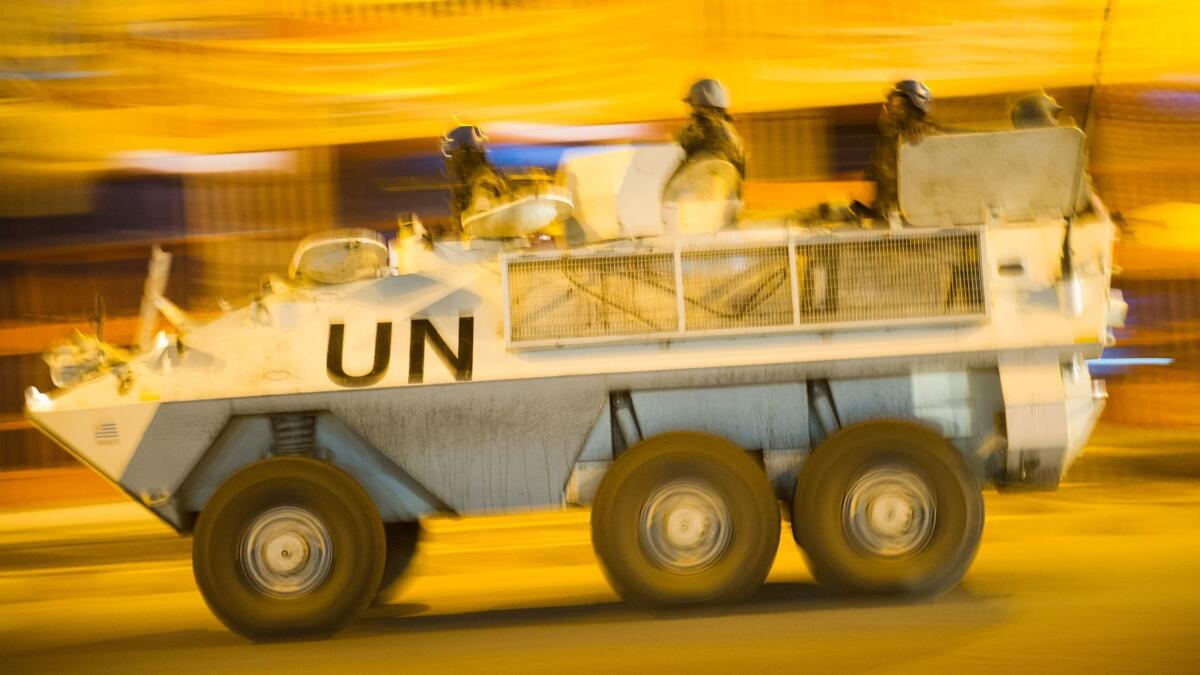 A United Nations armored personnel carrier drives through the city of Goma in eastern Democratic Republic of the Congo during an evening patrol on July 16, 2012.
