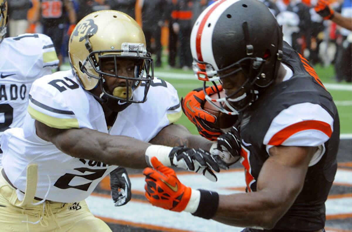 Oregon State receiver Brandin Cooks makes a touchdown catch against Colorado defensive back Kenneth Crawley in the final minute of the first half Saturday.