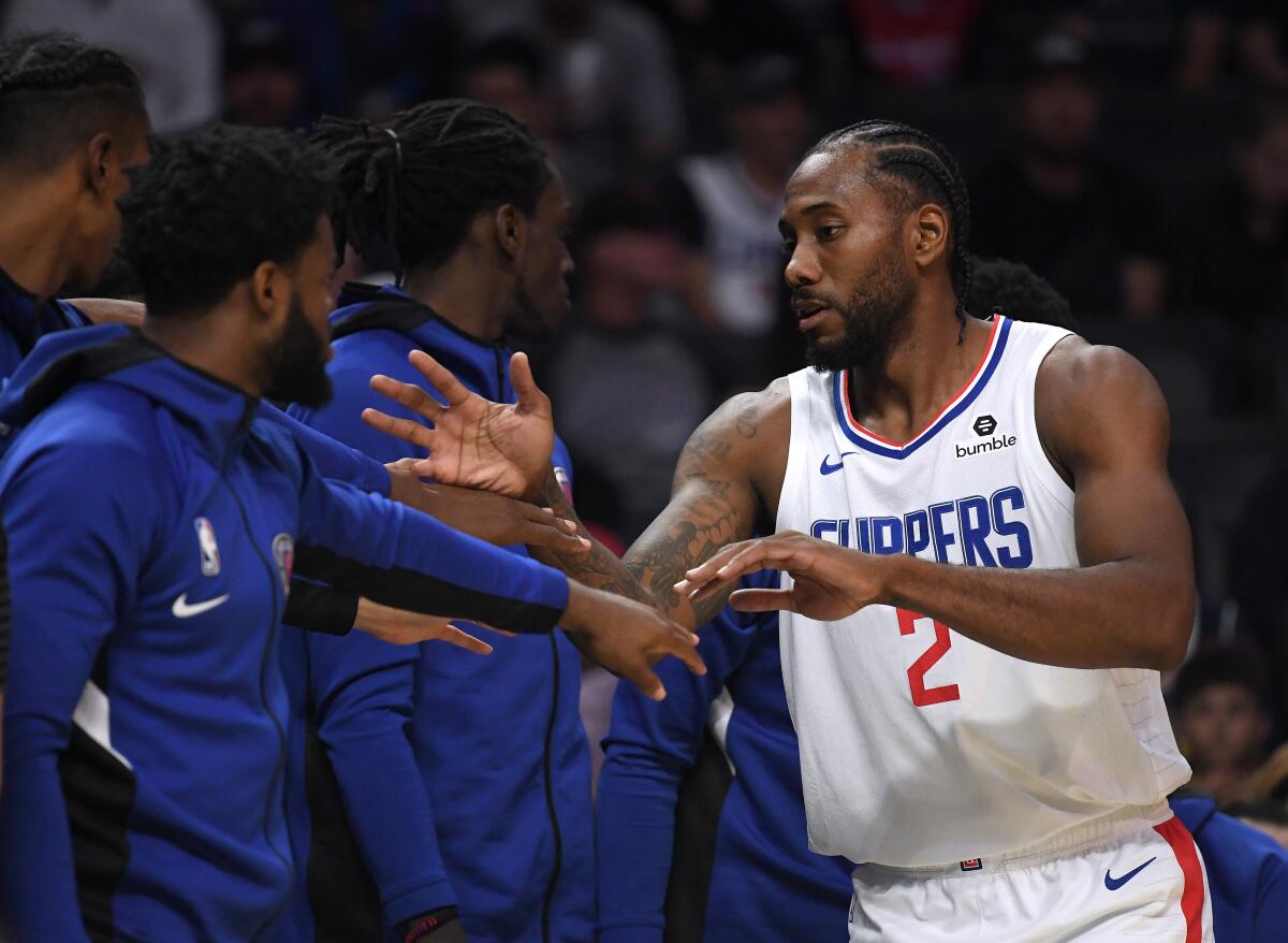 Clippers star Kawhi Leonard looks to begin a new era for the team when they tip off against the Lakers at Staples Center on Tuesday night.