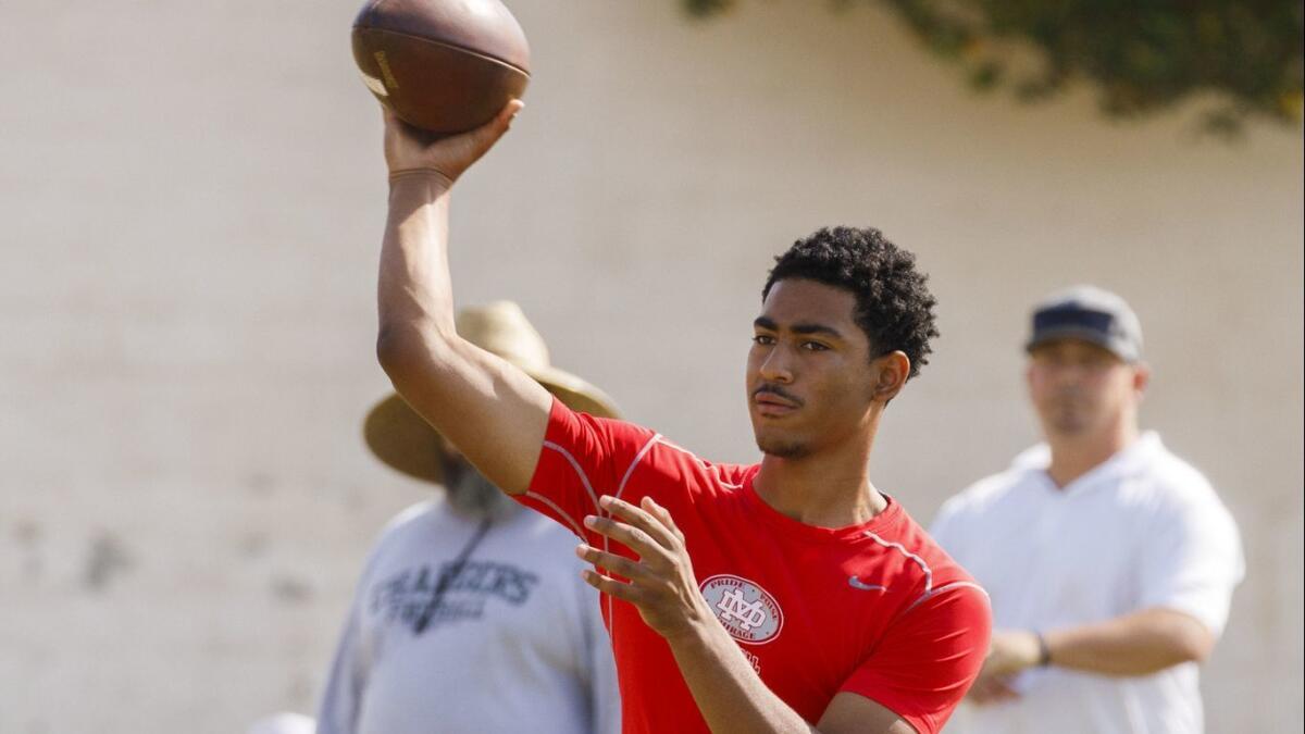 Mater Dei quarterback Bryce Young throws a pass during the Battle at the Beach summer varsity football passing league tournament at Edison High School on July 7, 2018 in Huntington Beach.