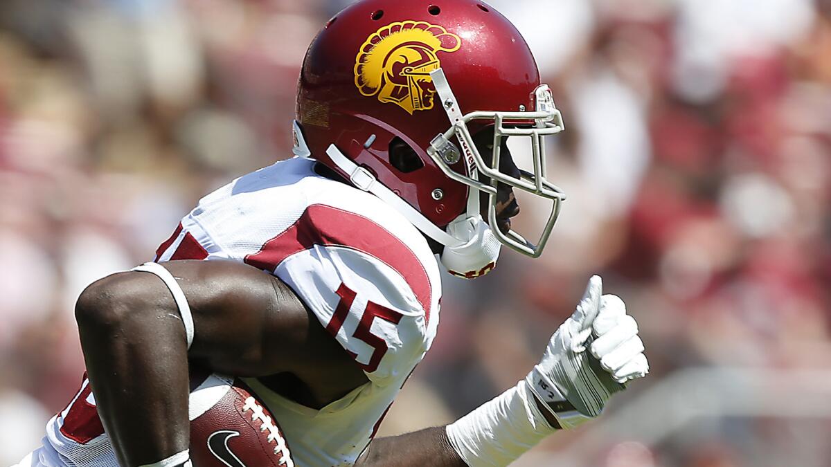 USC wide receiver Nelson Agholor returns a kick during Saturday's win over Stanford. Agholor has emerged as the top target in the Trojans' receiving corps.
