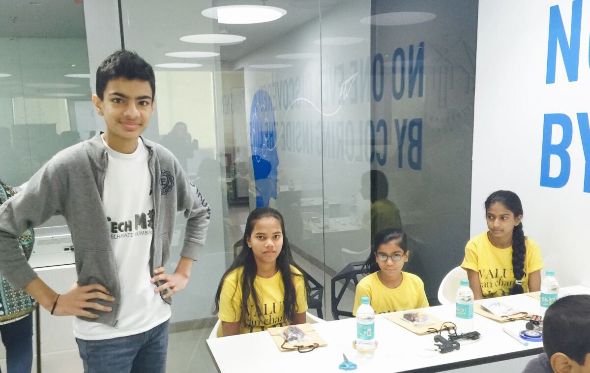 Jaiv Doshi holds a workshop to introduce  Scratch programming by building a simple robot.