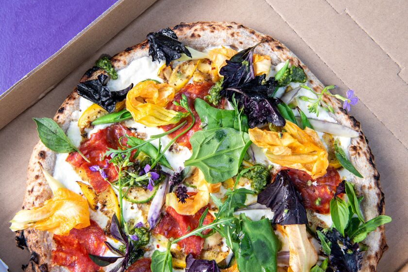 WEST HOLLYWOOD , CA - JULY 08: Windsor Hills pizza from 'Brandoni Pepperoni at the West Hollywood Gateway on Wednesday, July 8, 2020 in West Hollywood , CA. Owner, Brandon Gray, sources all his ingredients from the Santa Monica Farmers Market. (Mariah Tauger / Los Angeles Times)