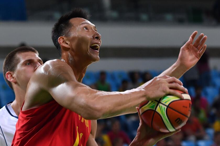 China forward Yi Jianlian goes to the basket during an Olympics Group A basketball game against Serbia at the Carioca Arena 1 in Rio de Janeiro on Aug. 14.