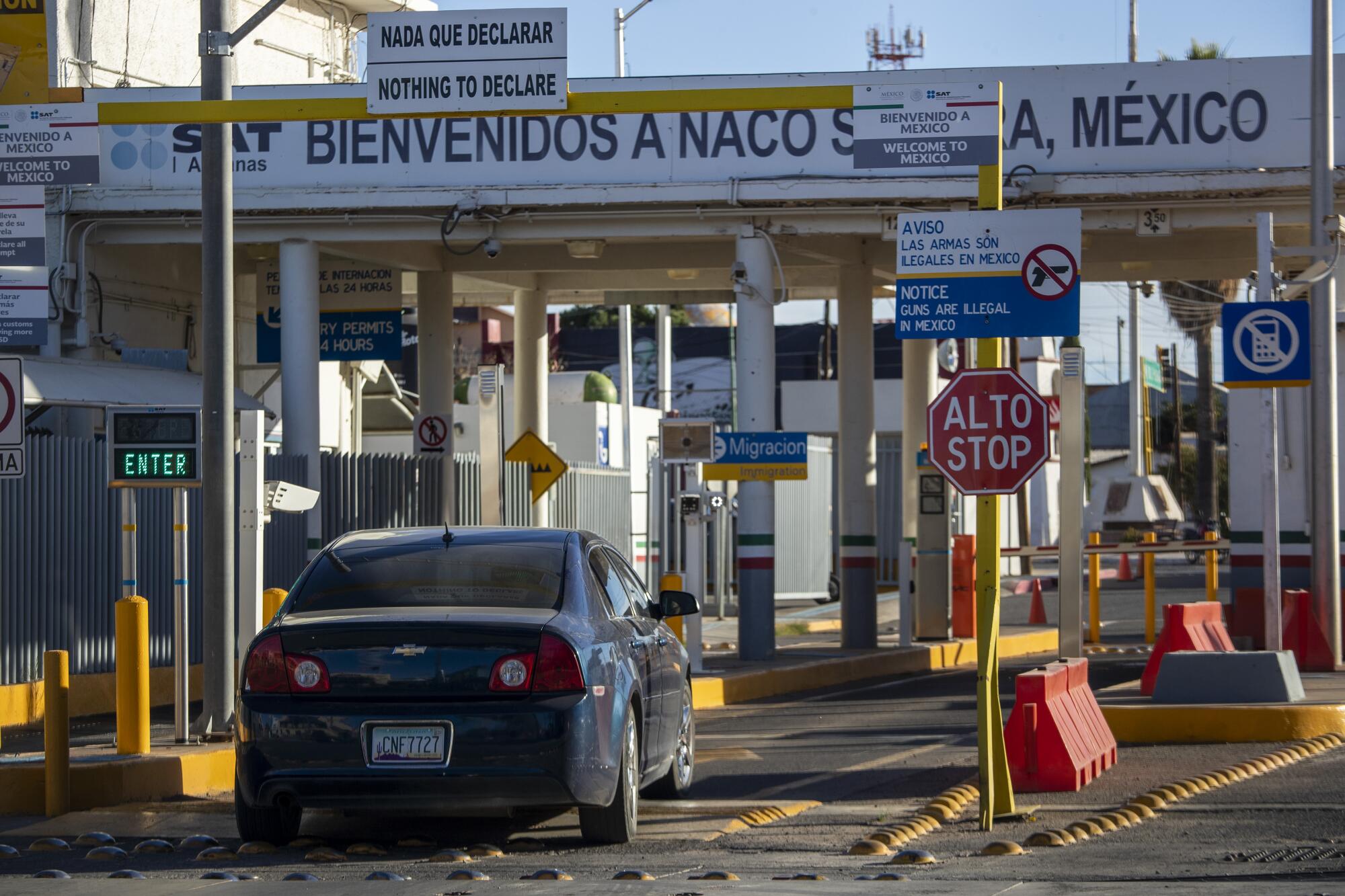 A vehicle drives into the border checkpoint in Naco Sonora in view from Naco, AZ.