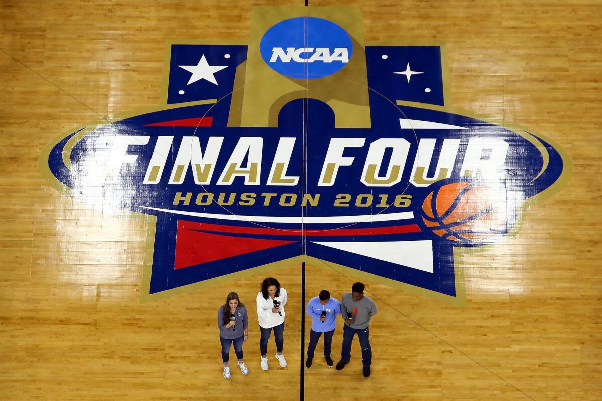 Villanova's Karlie Crispin, Oklahoma's Madison Ward, North Carolina's Nico Melo and Syracuse's Chevis Armstead II perform the national anthem before a Final Four game.