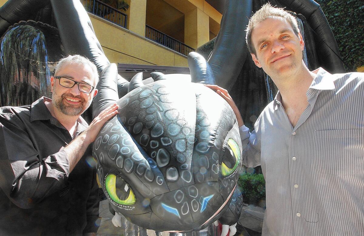 Pierre-Olivier Vincent "POV" (Production Designer) and Simon Otto (Head of Character Animation) next to a character from the movie "How to Train Your Dragon 2" at Dreamworks Studios on Monday, June 2, 2014.